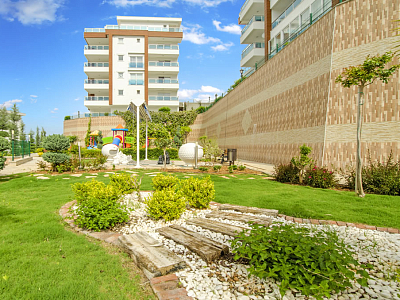 Меблированные апартаменты планировкой 2+1 в районе Каргыджак Аланья