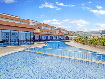 Меблированные апартаменты планировкой 2+1 в районе Каргыджак Аланья