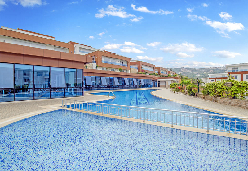 Меблированные апартаменты планировкой 2+1 в районе Каргыджак Аланья