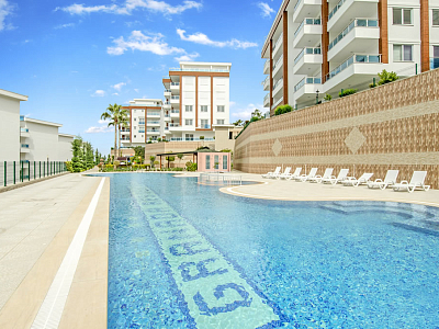 Меблированные апартаменты планировкой 2+1 в районе Каргыджак Аланья