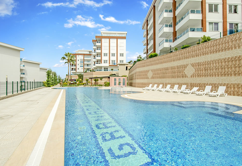 Меблированные апартаменты планировкой 2+1 в районе Каргыджак Аланья