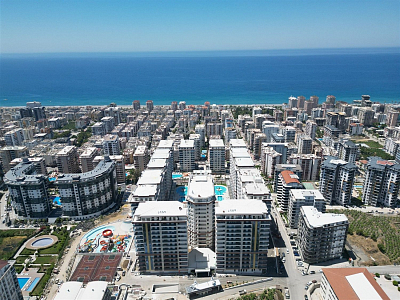 Квартира планировкой 1+1 в районе Махмутлар