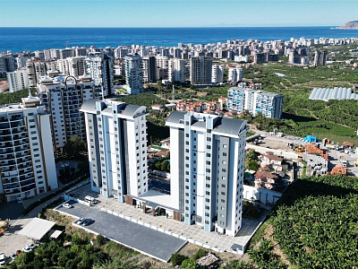 Меблированные апартаменты с планировкой 1+1 в районе Махмутлар