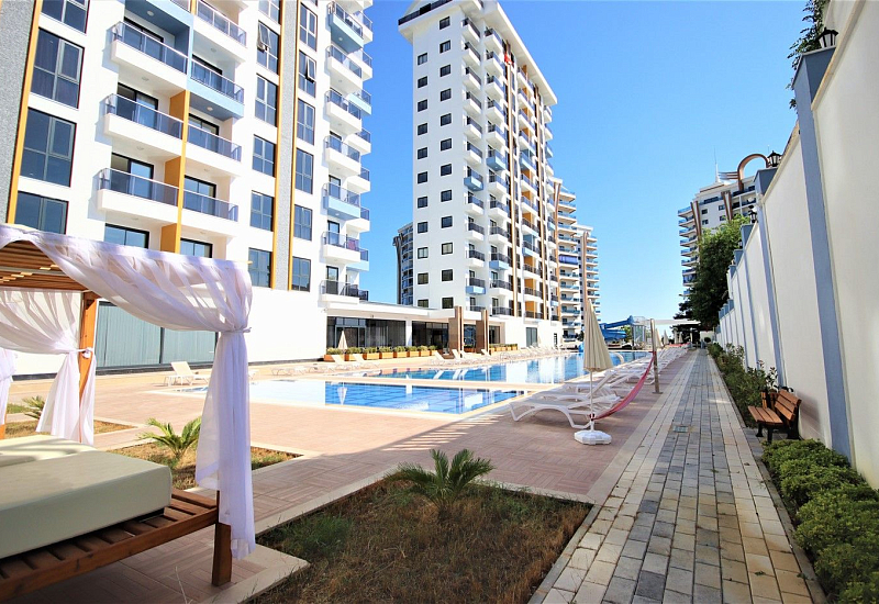 Меблированные апартаменты с планировкой 1+1 в районе Махмутлар