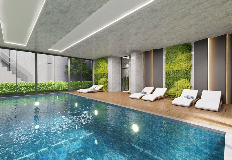 Новые апартаменты 1+1 на первой береговой линии в Махмутларе