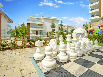 Меблированные апартаменты планировкой 2+1 в районе Каргыджак Аланья