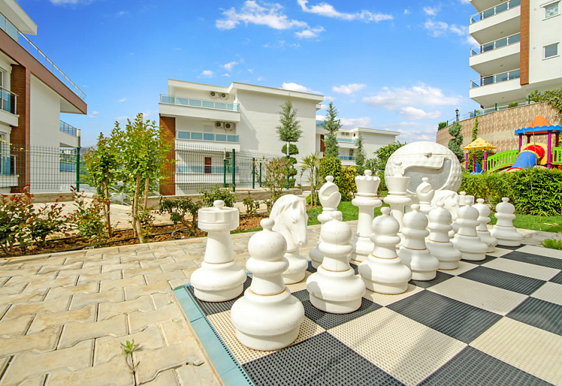 Меблированные апартаменты планировкой 2+1 в районе Каргыджак Аланья