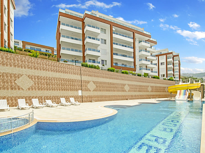 Меблированные апартаменты планировкой 2+1 в районе Каргыджак Аланья