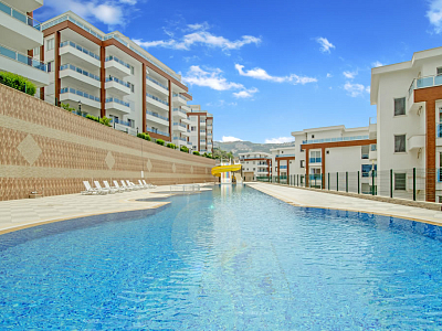 Меблированные апартаменты планировкой 2+1 в районе Каргыджак Аланья