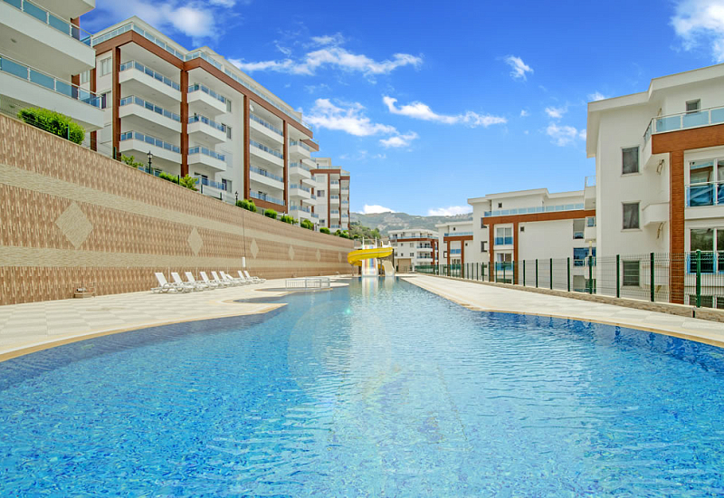 Меблированные апартаменты планировкой 2+1 в районе Каргыджак Аланья