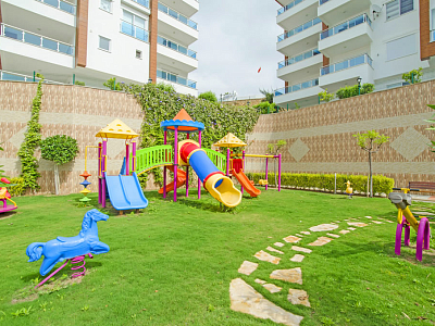 Меблированные апартаменты планировкой 2+1 в районе Каргыджак Аланья