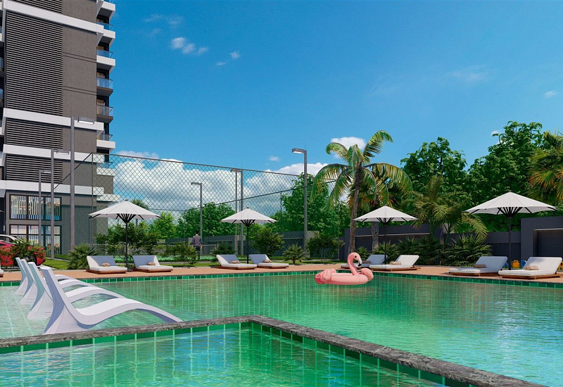 Новые апартаменты 1+1 на первой береговой линии в Махмутларе