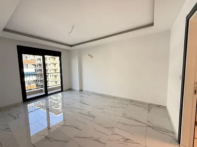 Квартира планировкой 2+1 в популярном районе Махмутлар Аланья