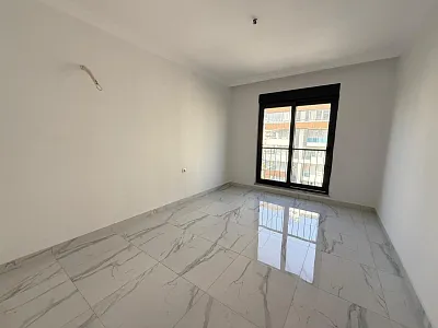 Квартира планировкой 2+1 в популярном районе Махмутлар Аланья