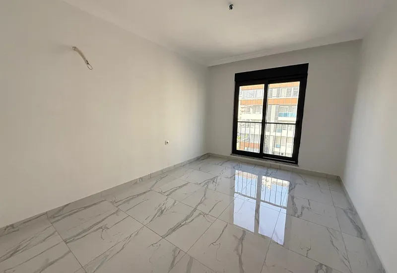 Квартира планировкой 2+1 в популярном районе Махмутлар Аланья