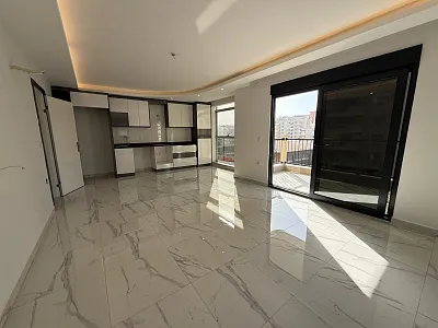 Квартира планировкой 2+1 в популярном районе Махмутлар Аланья