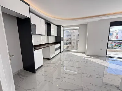 Квартира планировкой 2+1 в популярном районе Махмутлар Аланья