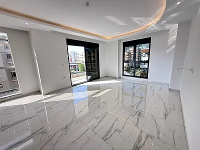 Квартира планировкой 2+1 в популярном районе Махмутлар Аланья