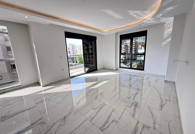 Квартира планировкой 2+1 в популярном районе Махмутлар Аланья